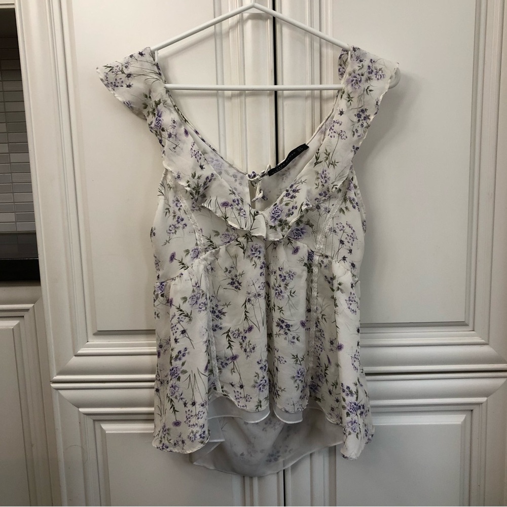 Zara women’s lined sleeveless floral blouse